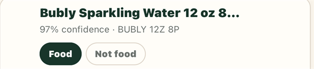 The top of a reviewed receipt line. The name reads Bubly Sparkling Water 12 oz 8 dots, and underneath it, 97 percent confidence, BUBLY 12Z 8P. Food is selected over Not food.